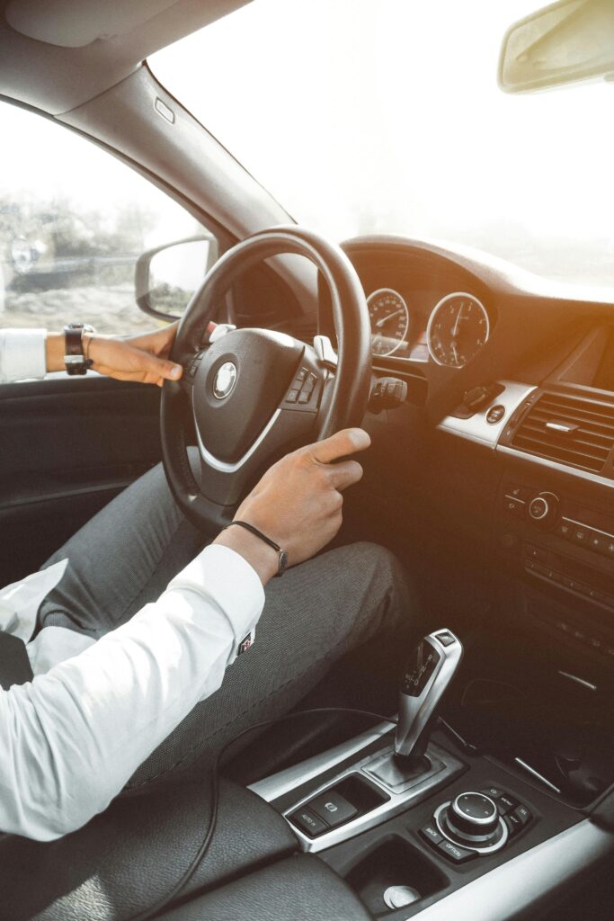 driver at wheel of rideshare car